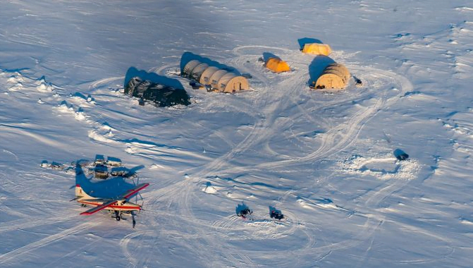 How the submarine punches a solid-Arctic ice