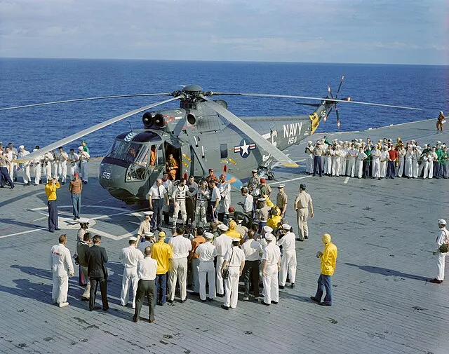 Gemini-7-crew-on-carrier