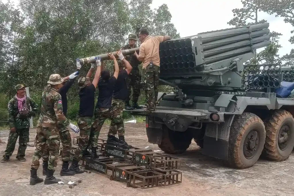 Cambodian soldiers reload the BM-21 grad