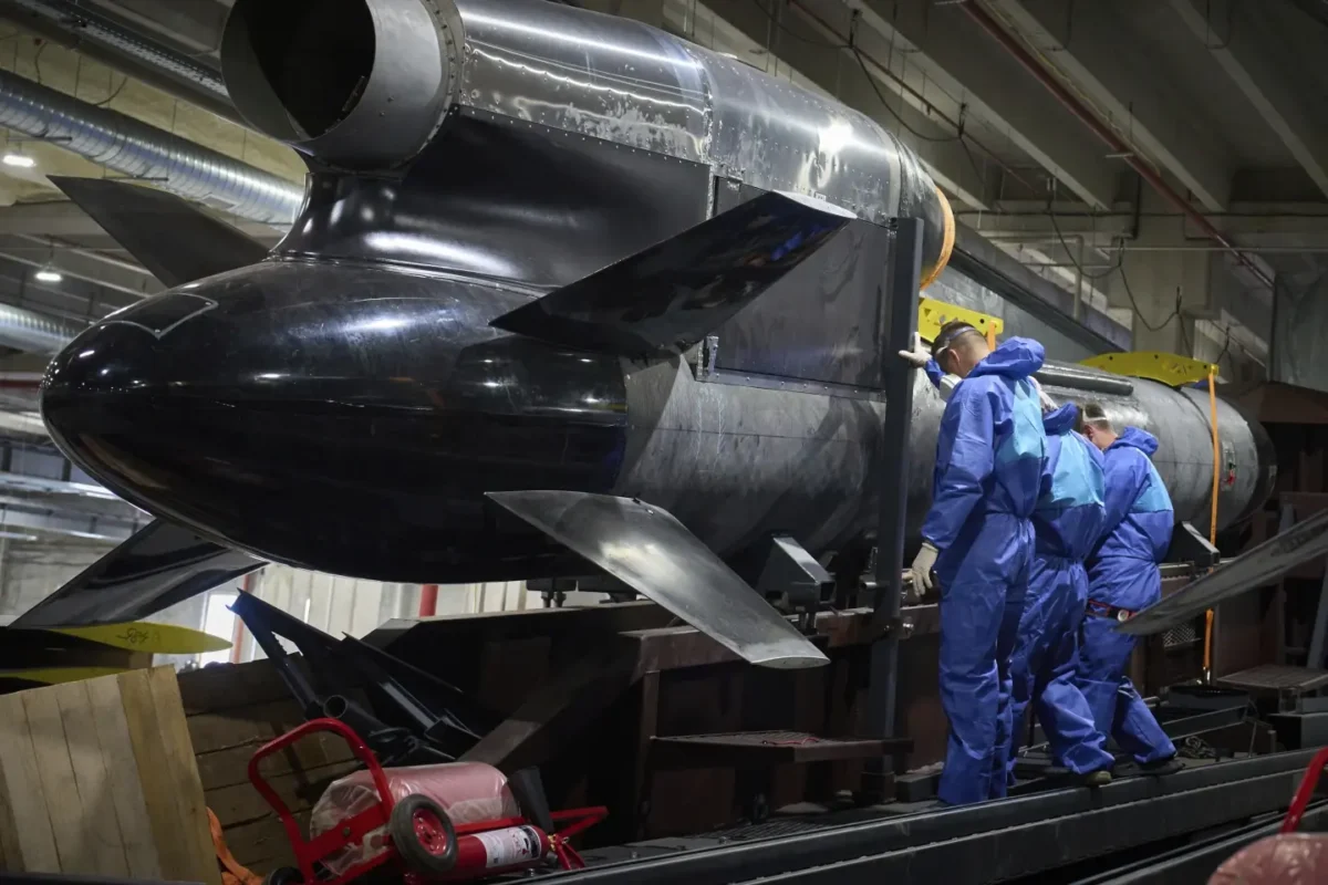 Worker inspects Flamingo missile in Ukraine, Aug 8, 2025.