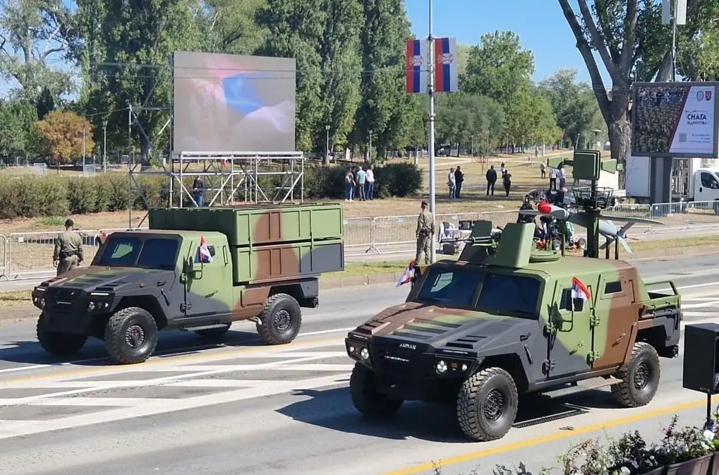 The Serbian Aleksandar Unifier 4x4 armored vehicle with a roof-mounted 12.7 mm machine gun. 
