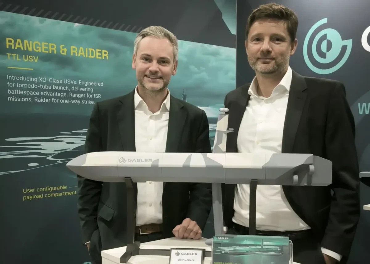 Gabler’s Lars Wischnewski and David Schirm with Ranger and Raider USV models at DWT Workshop