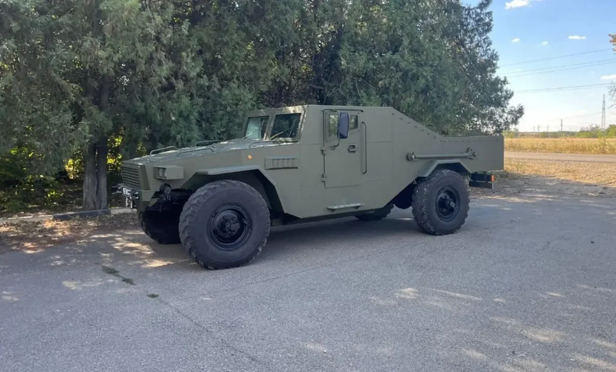 russian legioner light armored vehicle side view 1 Russian Legioner 4×4 light armored vehicle side view against open terrain