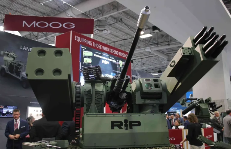 Lightweight RIwP turret fitted with a stabilized 30 mm cannon, Stinger/rocket pods, and swap-in sensor suites for mobile C-UAS and SHORAD roles.