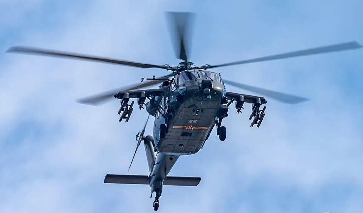 pla z 20t assault helicopter armed Chinese Z-20T assault helicopter in flight, equipped with missile pods and armaments.