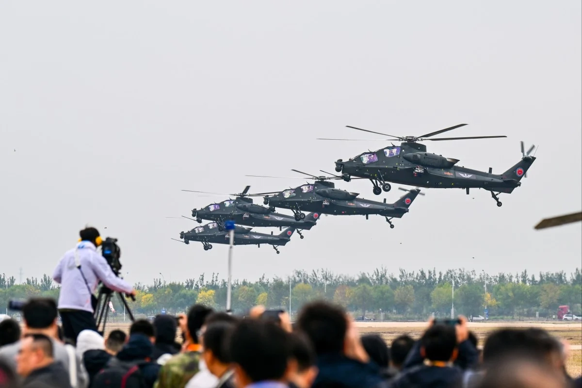 pla z 20t helicopters tianjin PLA helicopters perform during the opening ceremony of an annual exhibition in Tianjin.