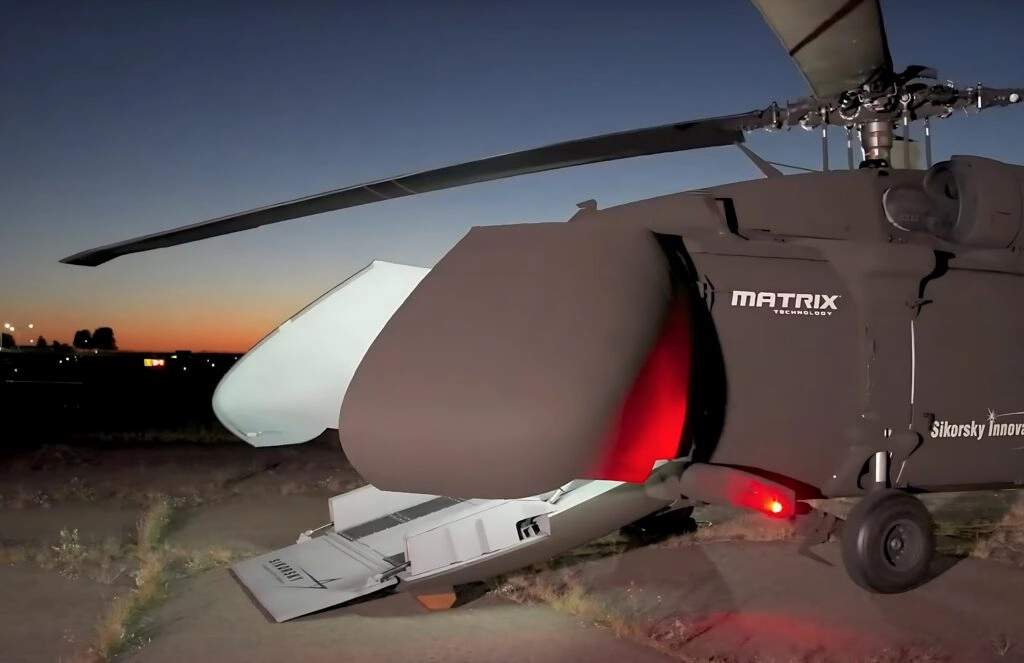 u hawk dusk red lighting open cargo The S-70UAS U-Hawk at dusk with open doors and red lights