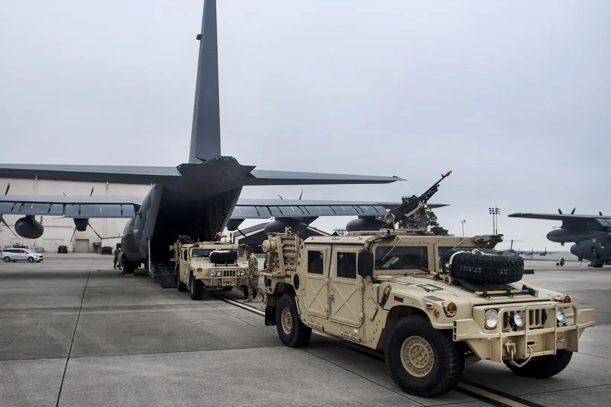 c 130j hercules loading humvee C-130J Hercules loading two humvee