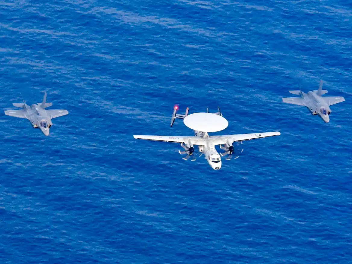 E-24D Hawkeye with F-35s